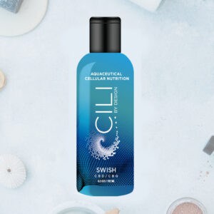 Ein blauer Flascheninhalt mit "Aquaceutical Cellular Nutrition" und "CBD" für hochwertige Hautpflege und CBD-Ernährung im Online-Shop.